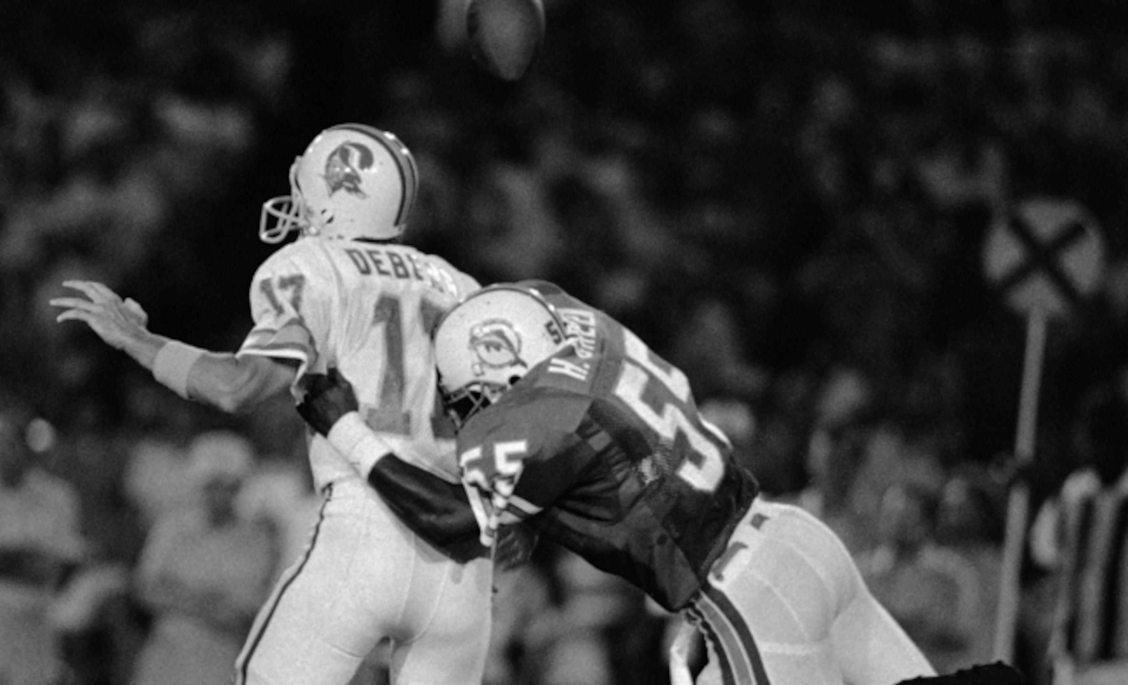 Steve DeBerg getting sacked. Steve DeBerg getting sacked.