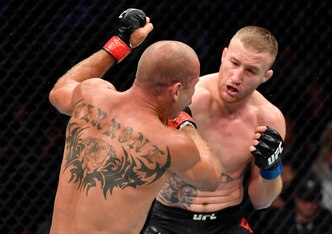 VANCOUVER, BRITISH COLUMBIA - SEPTEMBER 14:  (R-L) Justin Gaethje punches Donald Cerrone in their lightweight bout during the UFC Fight Night event at Rogers Arena on September 14, 2019 in Vancouver, Canada. (Photo by Jeff Bottari/Zuffa LLC/Zuffa LLC)
