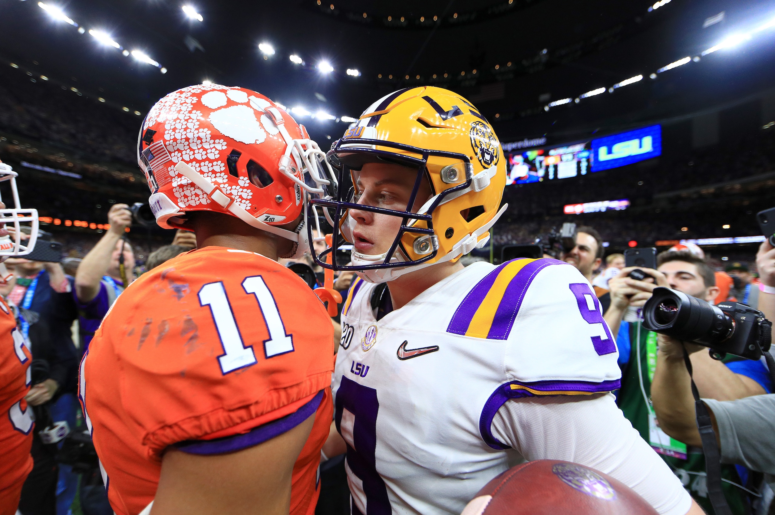 Isaiah Simmons (left) and Joe Burrow (right) after the national championship game Isaiah Simmons (left) and Joe Burrow (right) after the national championship game