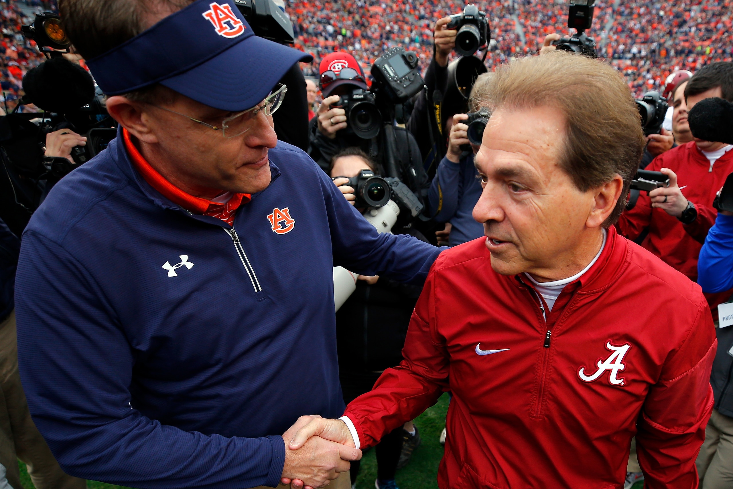 Gus Malzahn and Nick Saban Gus Malzahn and Nick Saban