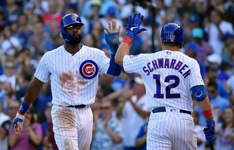 Jason Heyward (L) and Kyle Schwarber (R)