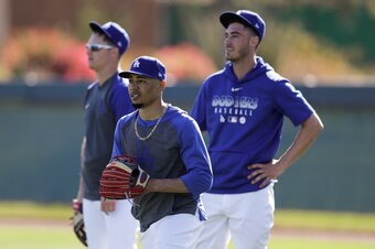 Joc Pederson (L), Mookie Betts (C) and Cody Bellinger (R)