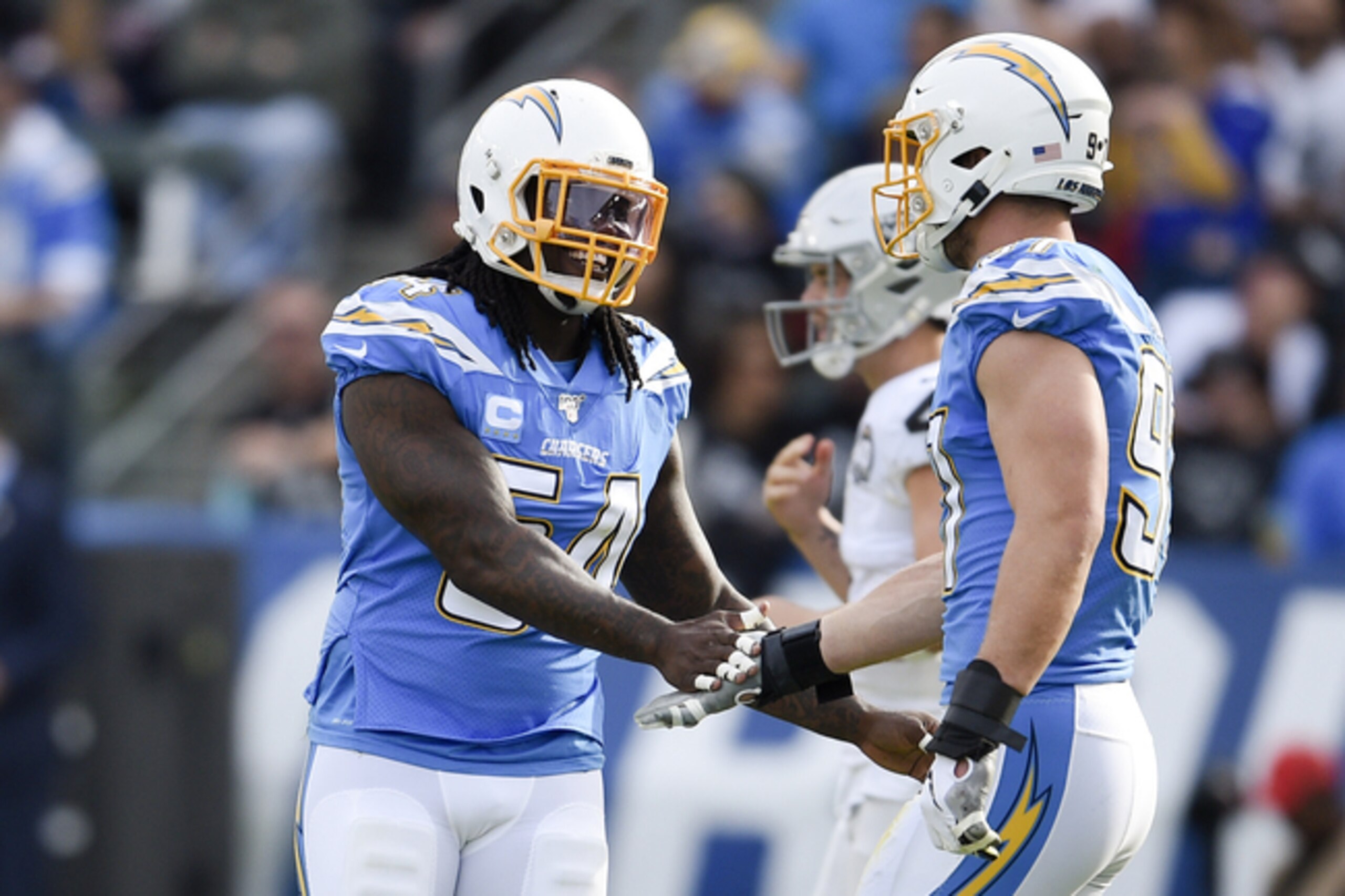 Los Angeles Chargers edge-rushers Melvin Ingram (left) and Joey Bosa (right)