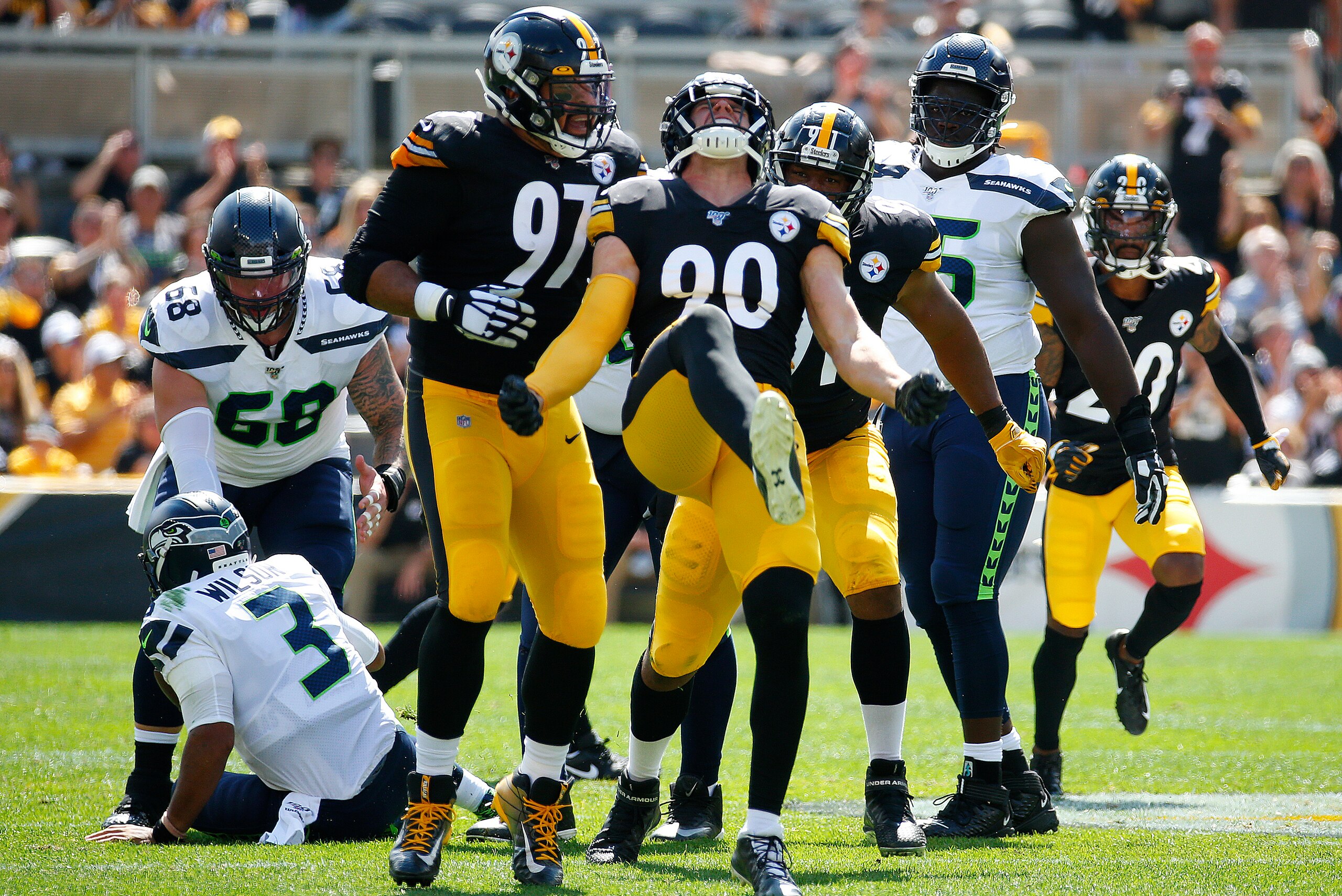 Pittsburgh Steelers defensive tackle Cameron Heyward (left) and edge-rusher T.J. Watt (right)