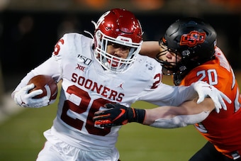 Oklahoma RB Kennedy Brooks and Oklahoma State LB Malcolm Rodriguez