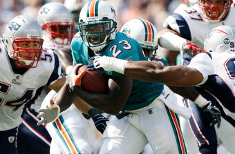 The Patriots had no answer for Ronnie Brown in the debut of the WIldcat offense.