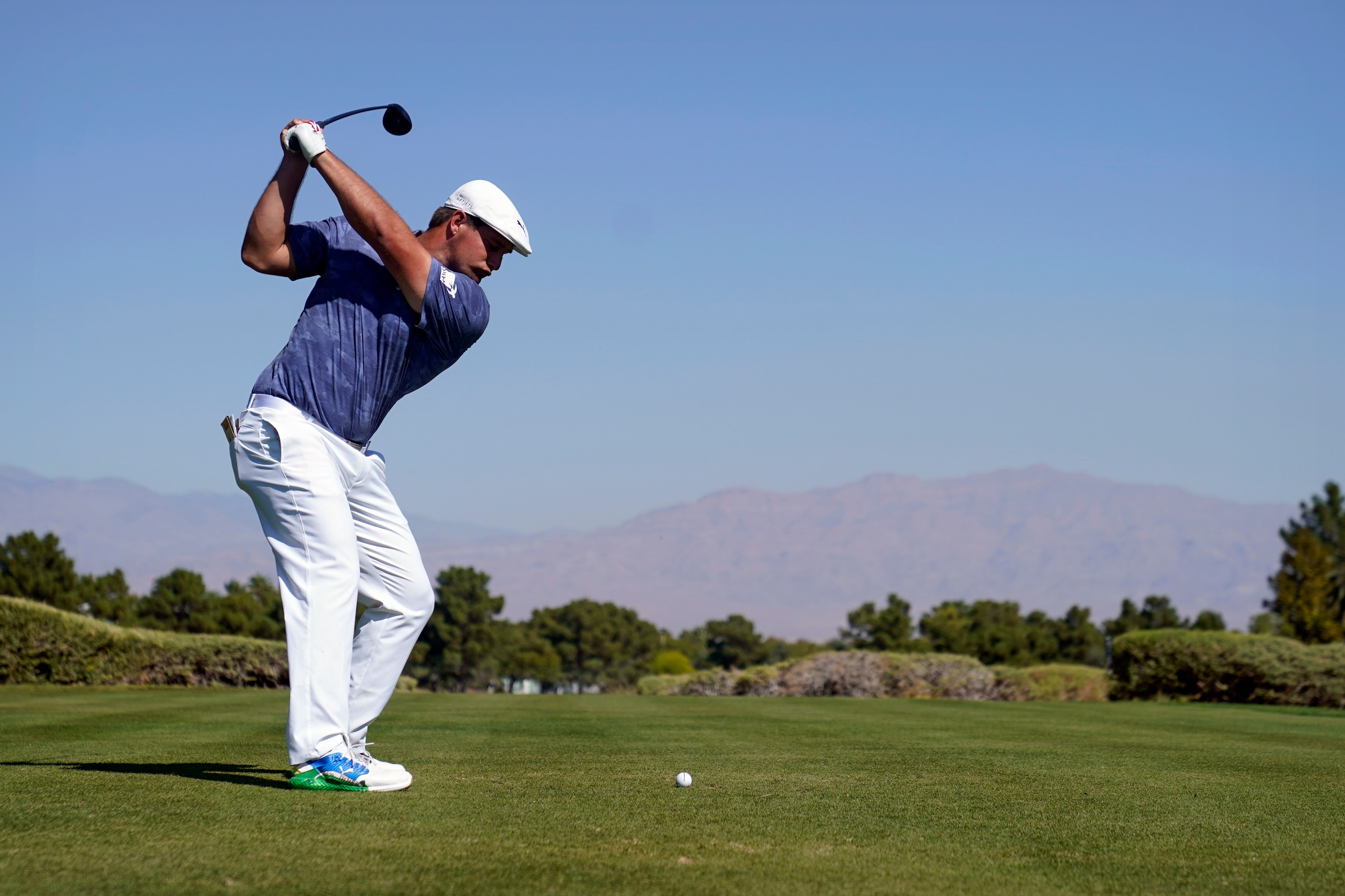 FILE - In this Oct. 11, 2020, file photo, Bryson DeChambeau hits off the 10th tee during the final round of Shriners Hospitals for Children Open golf tournament in Las Vegas. DeChambeau's bulk and power have made him the talk of golf going into the Master