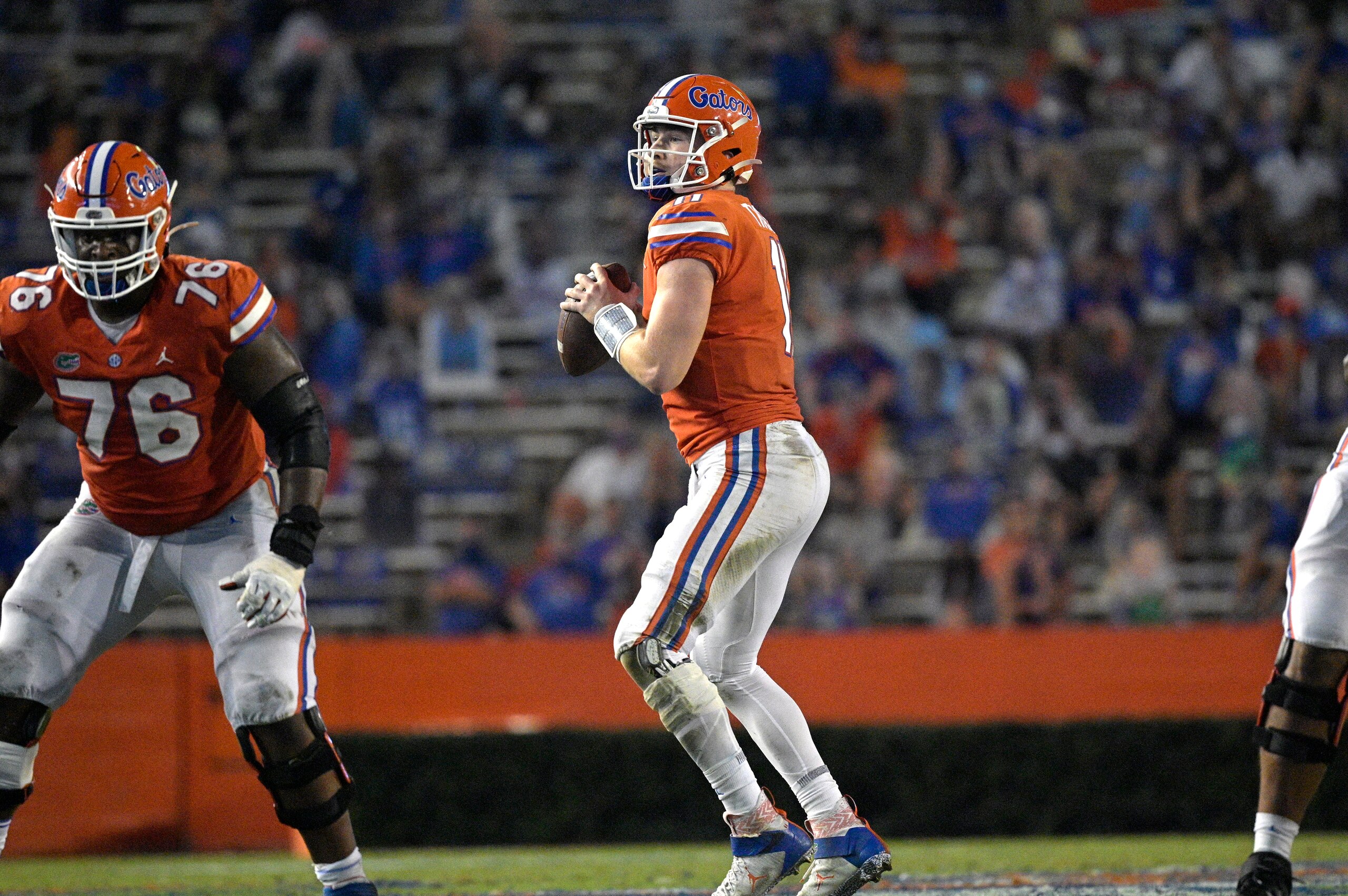 Florida quarterback Kyle Trask (11) sets up to throw a pass during the second half of an NCAA college football game against Arkansas, Saturday, Nov. 14, 2020, in Gainesville, Fla. (AP Photo/Phelan M. Ebenhack)