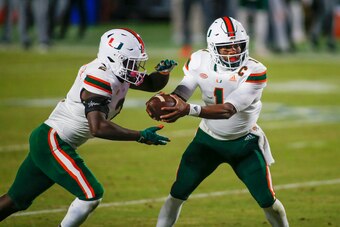 Miami's D'Eriq King (1) and Donald Chaney Jr. (2)