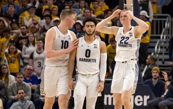 Sam Hauser (10) and Joey Hauser (22) with Marquette in 2019