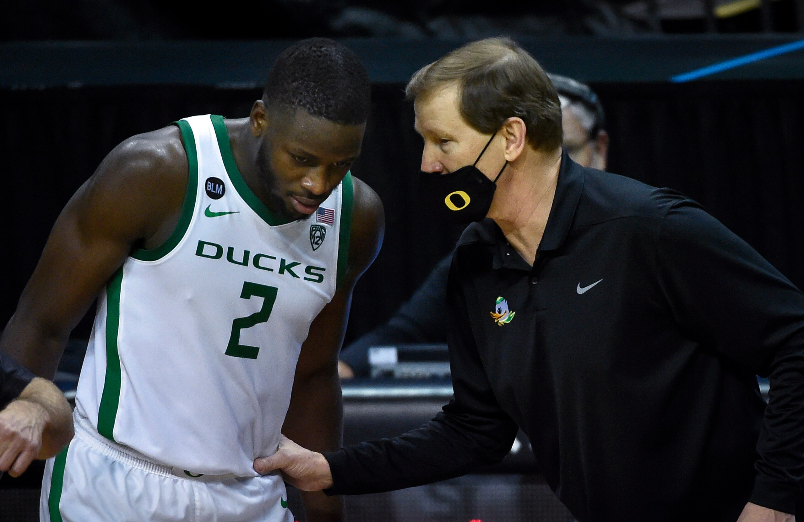 Oregon's Eugene Omoruyi and head coach Dana Altman