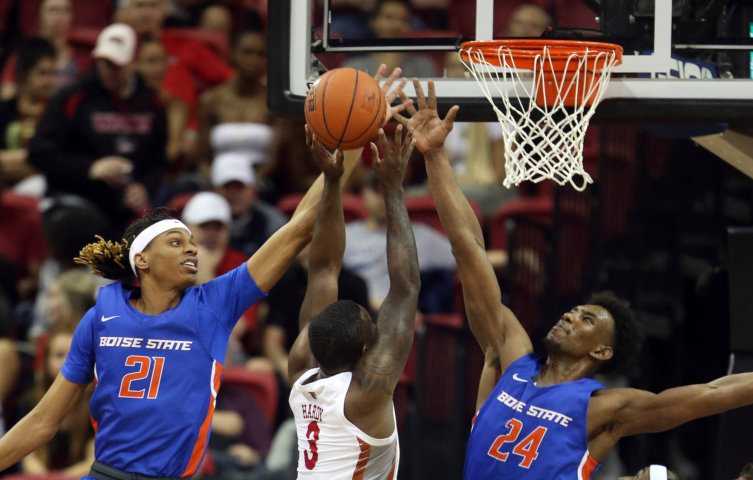 Boise State's Derrick Alston (21) and Abu Kigab (24)
