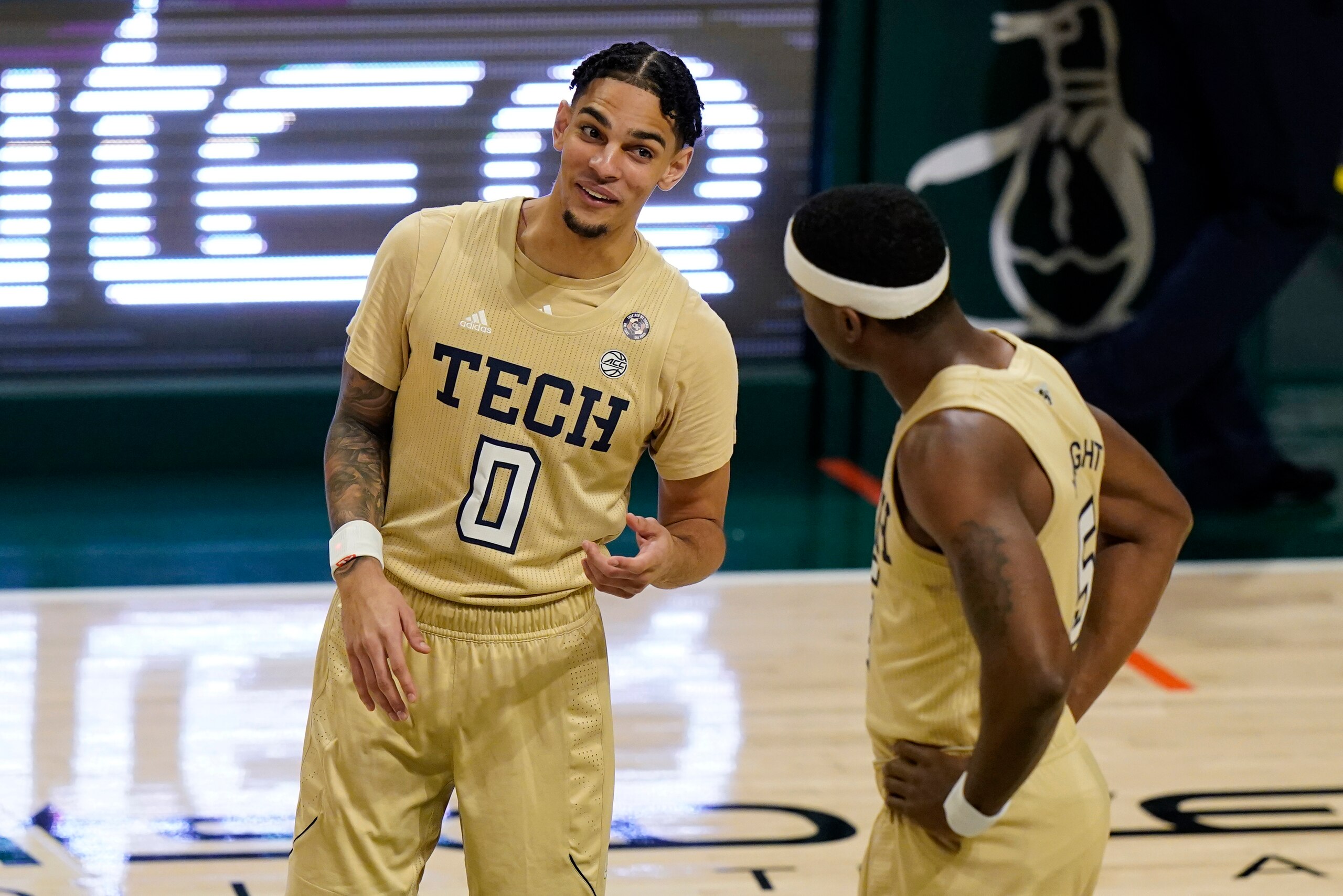 Georgia Tech's Michael Devoe (0) and Moses Wright (5)
