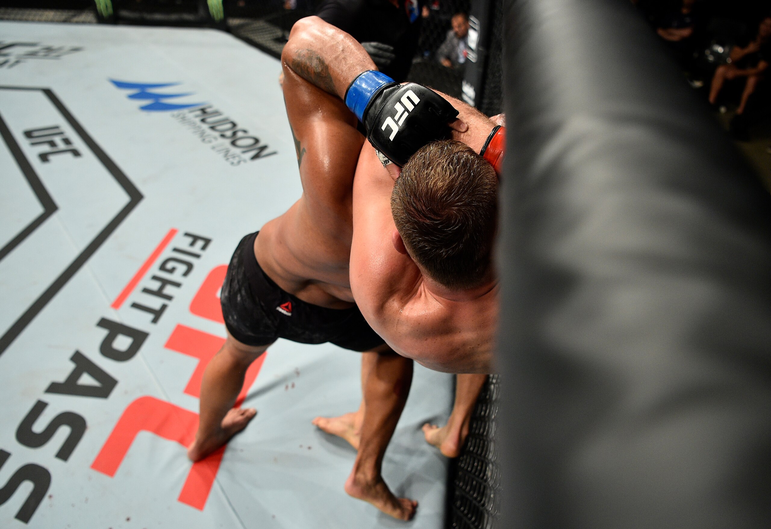 Jan Blachowicz locks up a standing rear-naked choke.