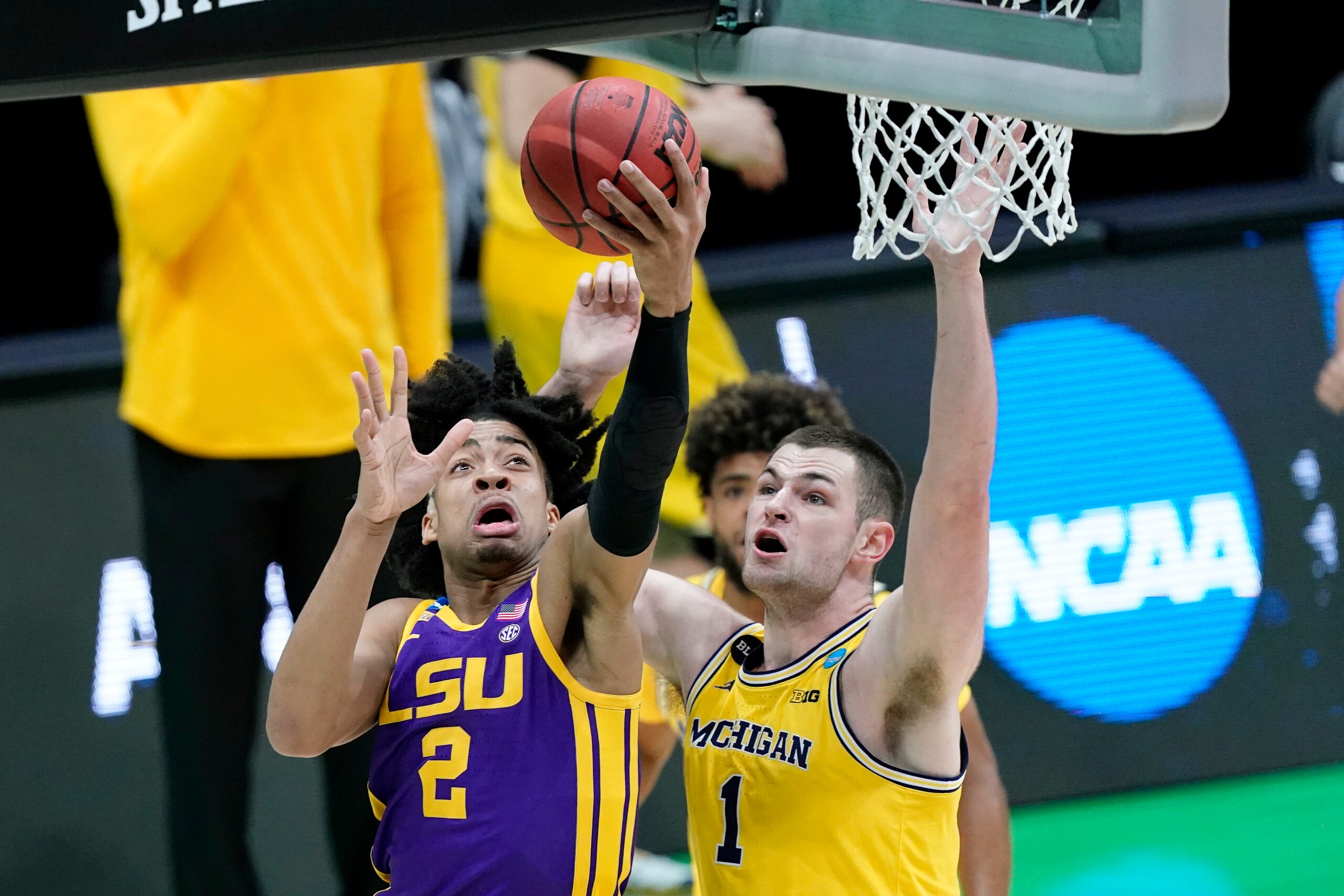 LSU's Trendon Watford and Michigan's Hunter Dickinson