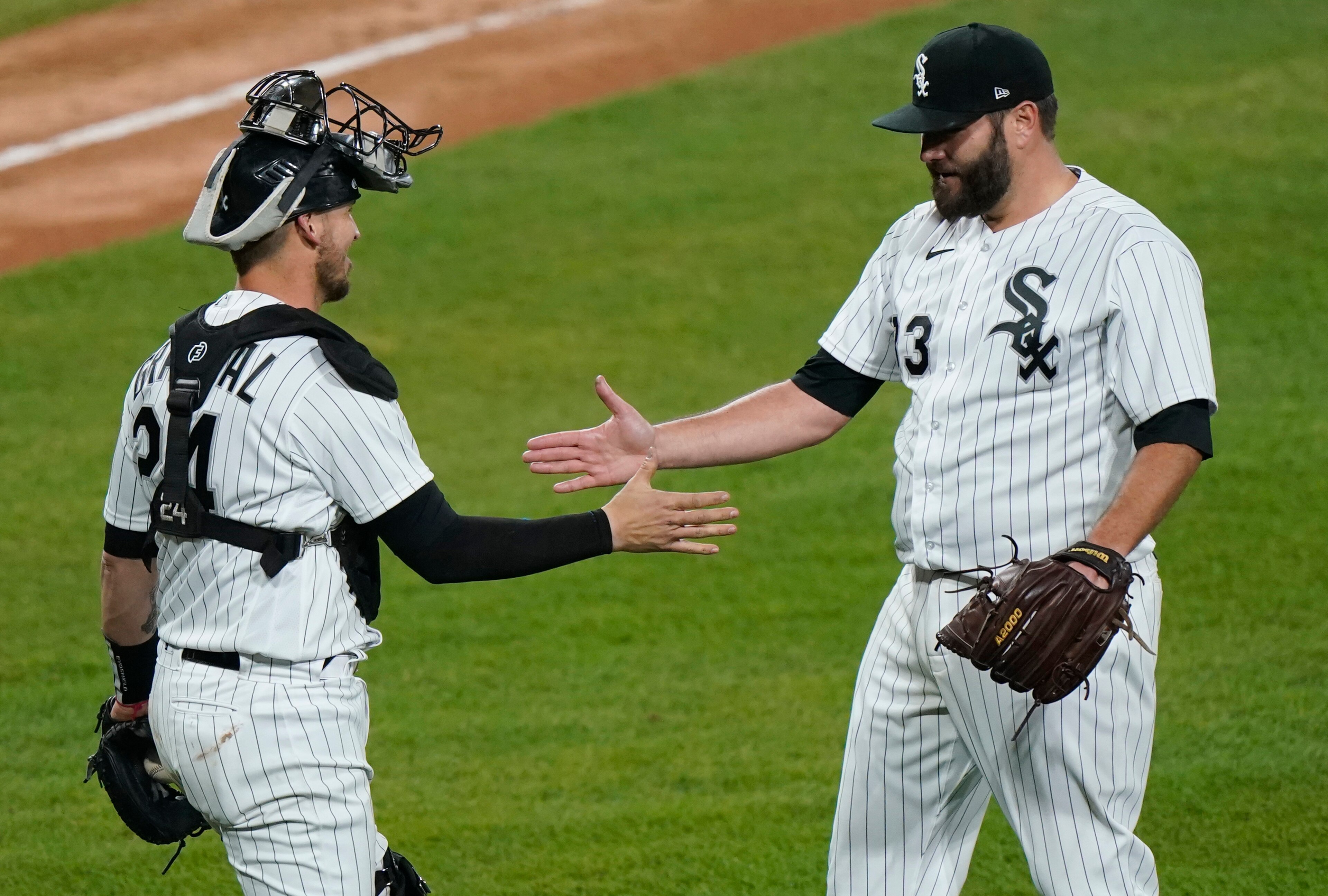 Yasmani Grandal and Lance Lynn