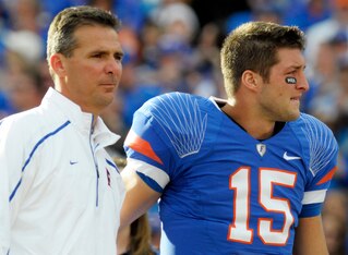 Urban Meyer and Tim Tebow