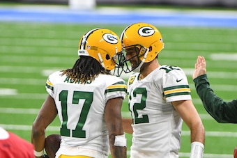 Wideout Davante Adams (left) and quarterback Aaron Rodgers (right)