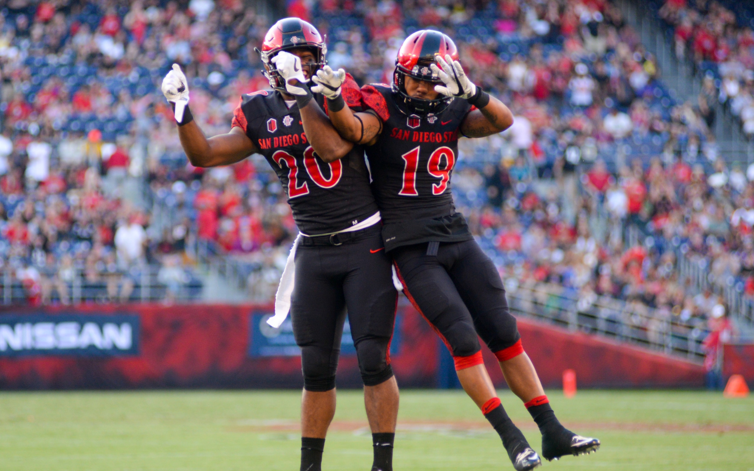 San Diego State's Rashaad Penny (20) and Donnel Pumphrey (19) San Diego State's Rashaad Penny (20) and Donnel Pumphrey (19)