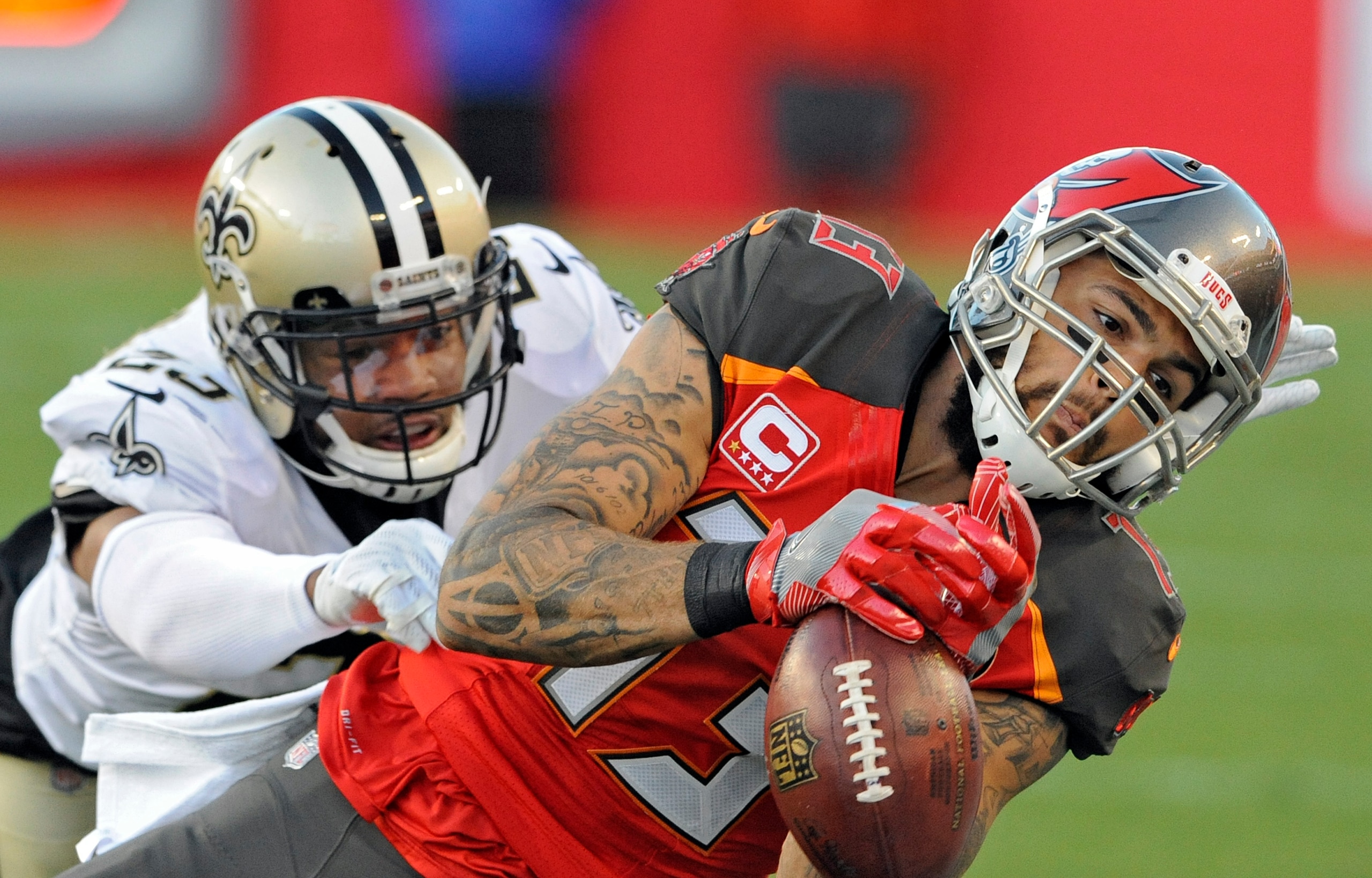 Saints CB Marshon Lattimore (left) and Buccaneers WR Mike Evans (right) Saints CB Marshon Lattimore (left) and Buccaneers WR Mike Evans (right)
