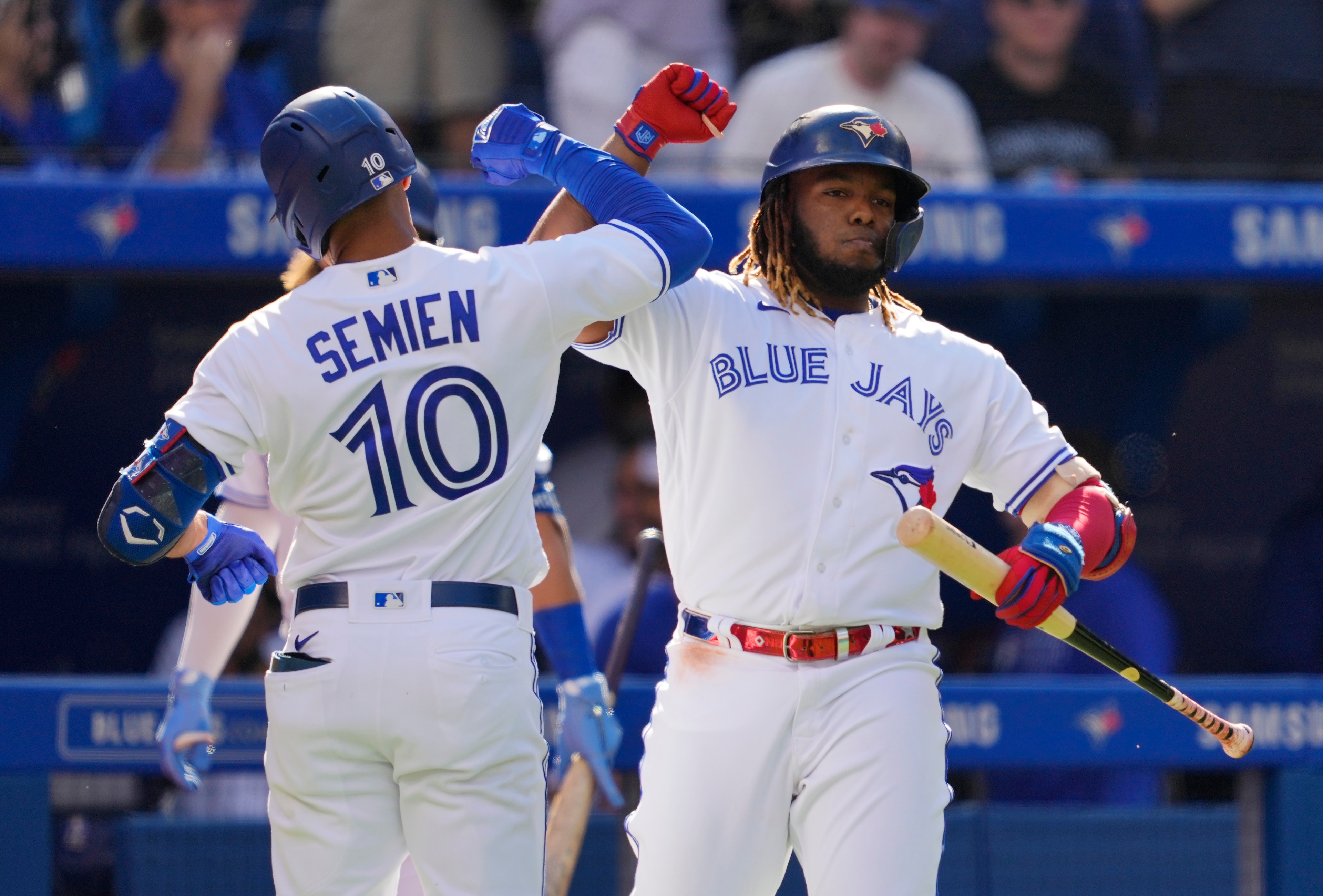 Marcus Semien and Vladimir Guerrero Jr. in the Toronto Blue Jays home jersey.