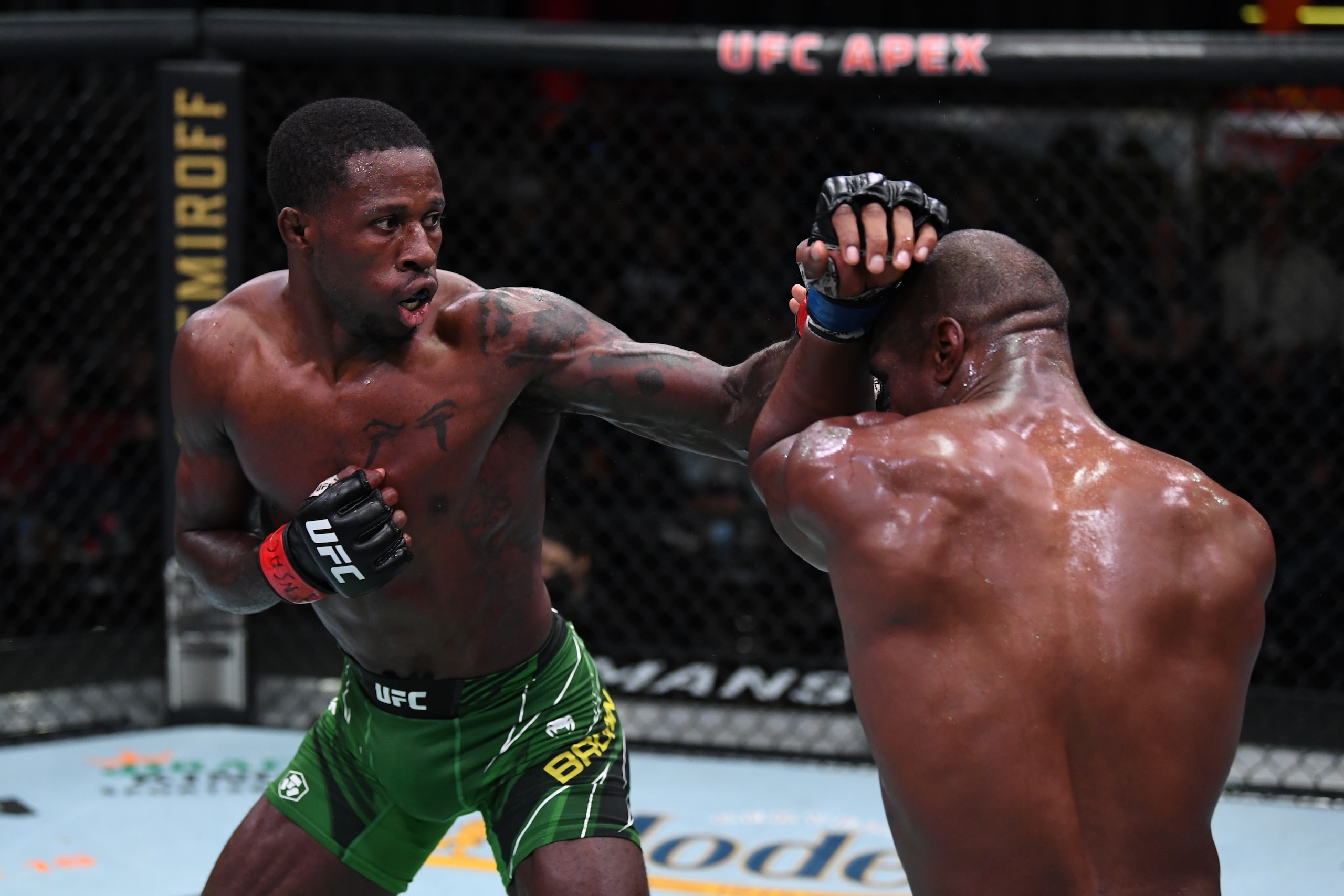 LAS VEGAS, NEVADA - OCTOBER 09: In this handout image provided by the UFC, (L-R) Randy Brown of Jamaica punches Jared Gooden in their welterweight bout during the UFC Fight Night event at UFC APEX on October 09, 2021 in Las Vegas, Nevada. (Photo by Josh H