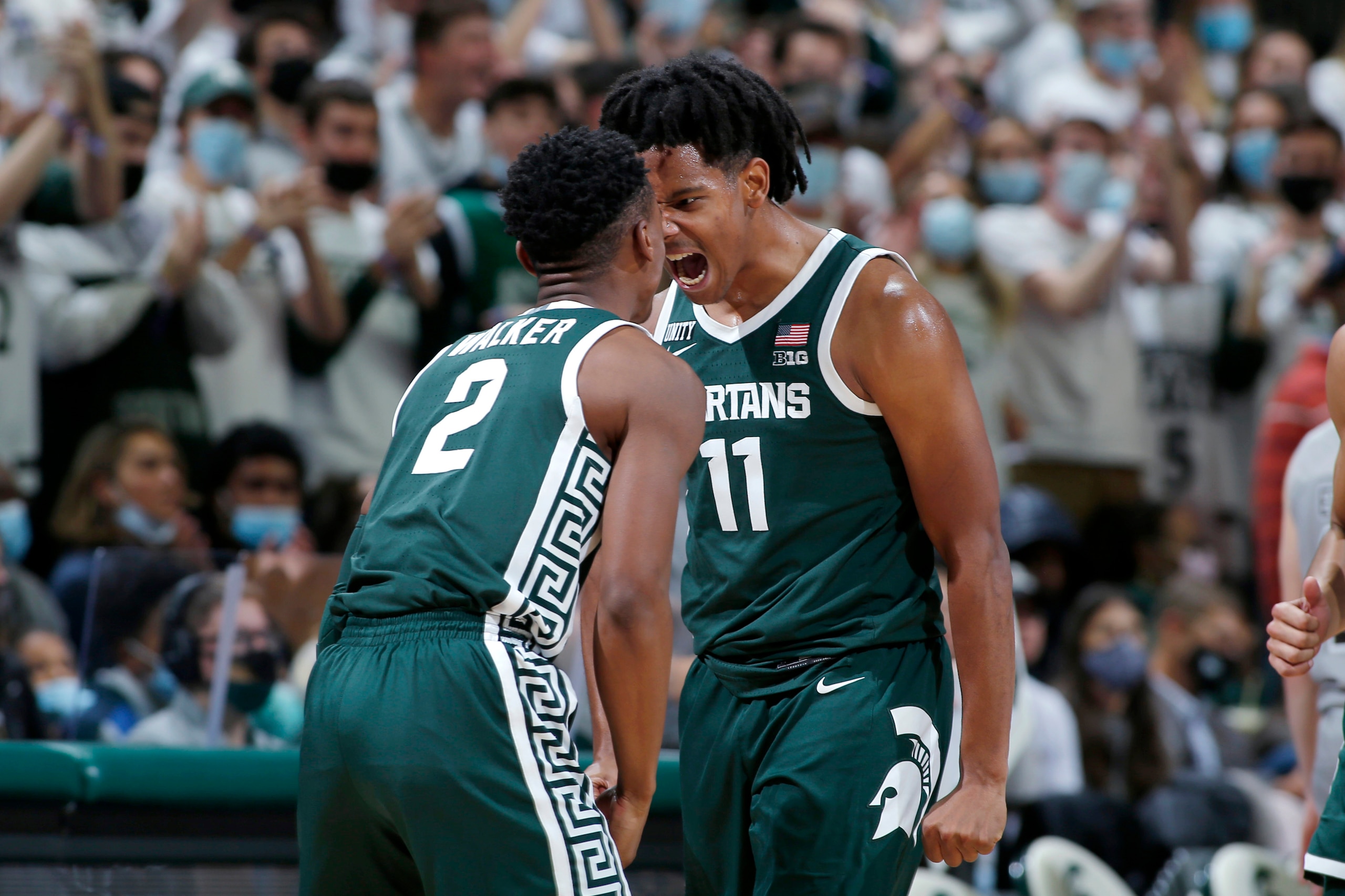 Michigan State's Tyson Walker (2) and A.J. Hoggard (11) Michigan State's Tyson Walker (2) and A.J. Hoggard (11)