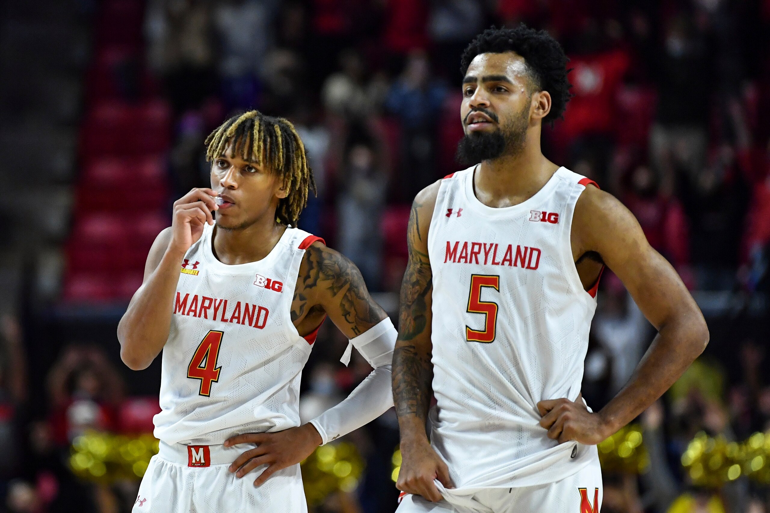 Maryland's Fatts Russell (4) and Eric Ayala (5)