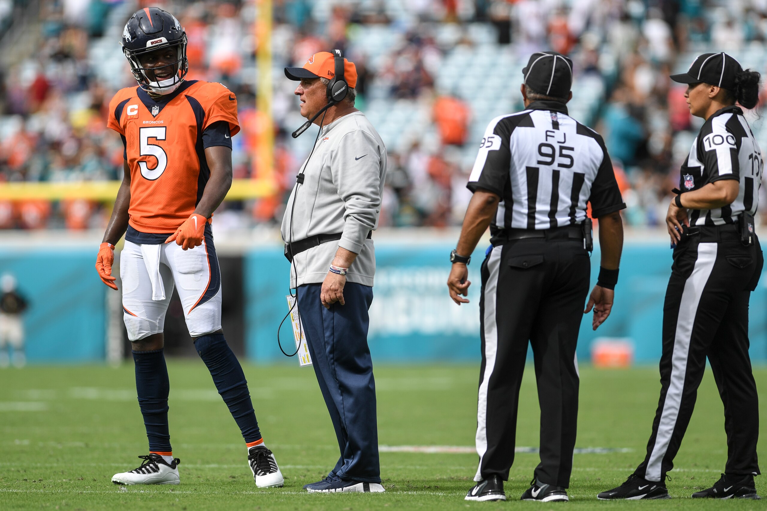 Denver Broncos quarterback Teddy Bridgewater (left) and head coach Vic Fangio (center)