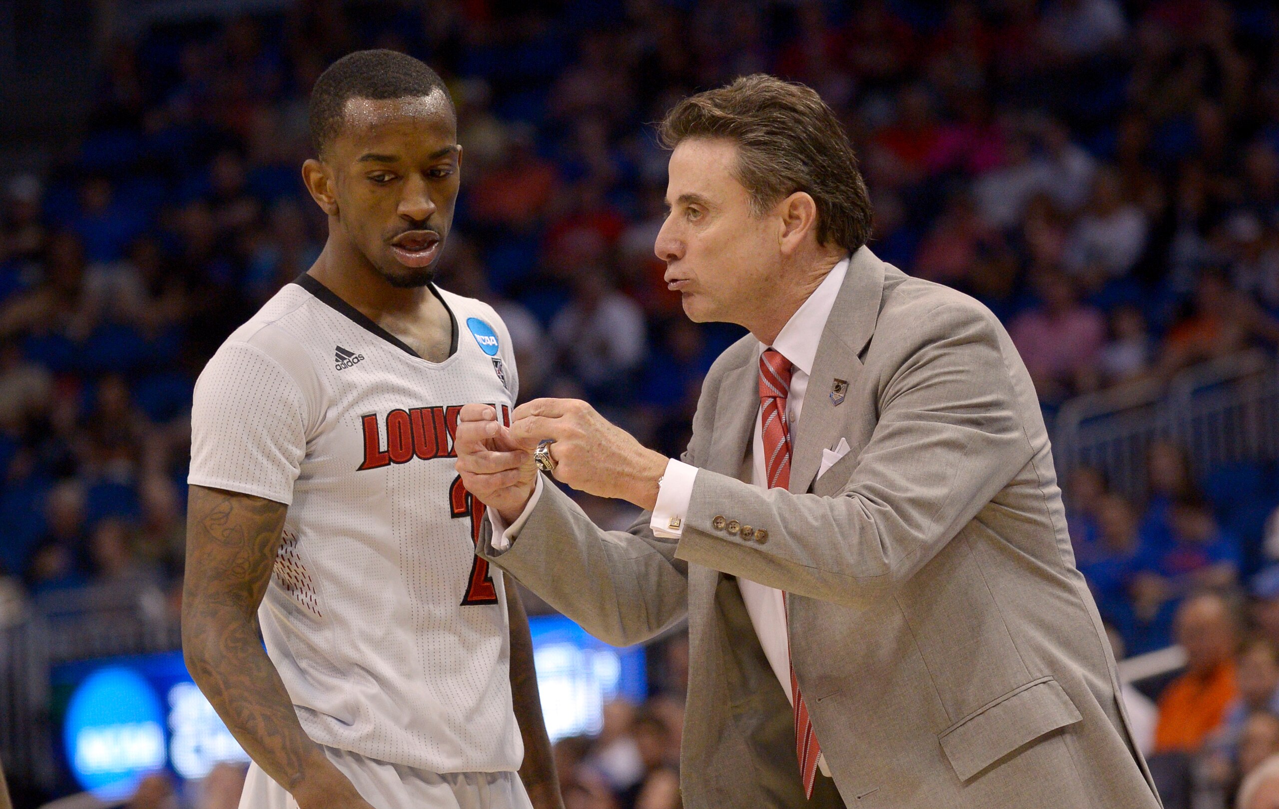 Louisville's Russ Smith and Rick Pitino