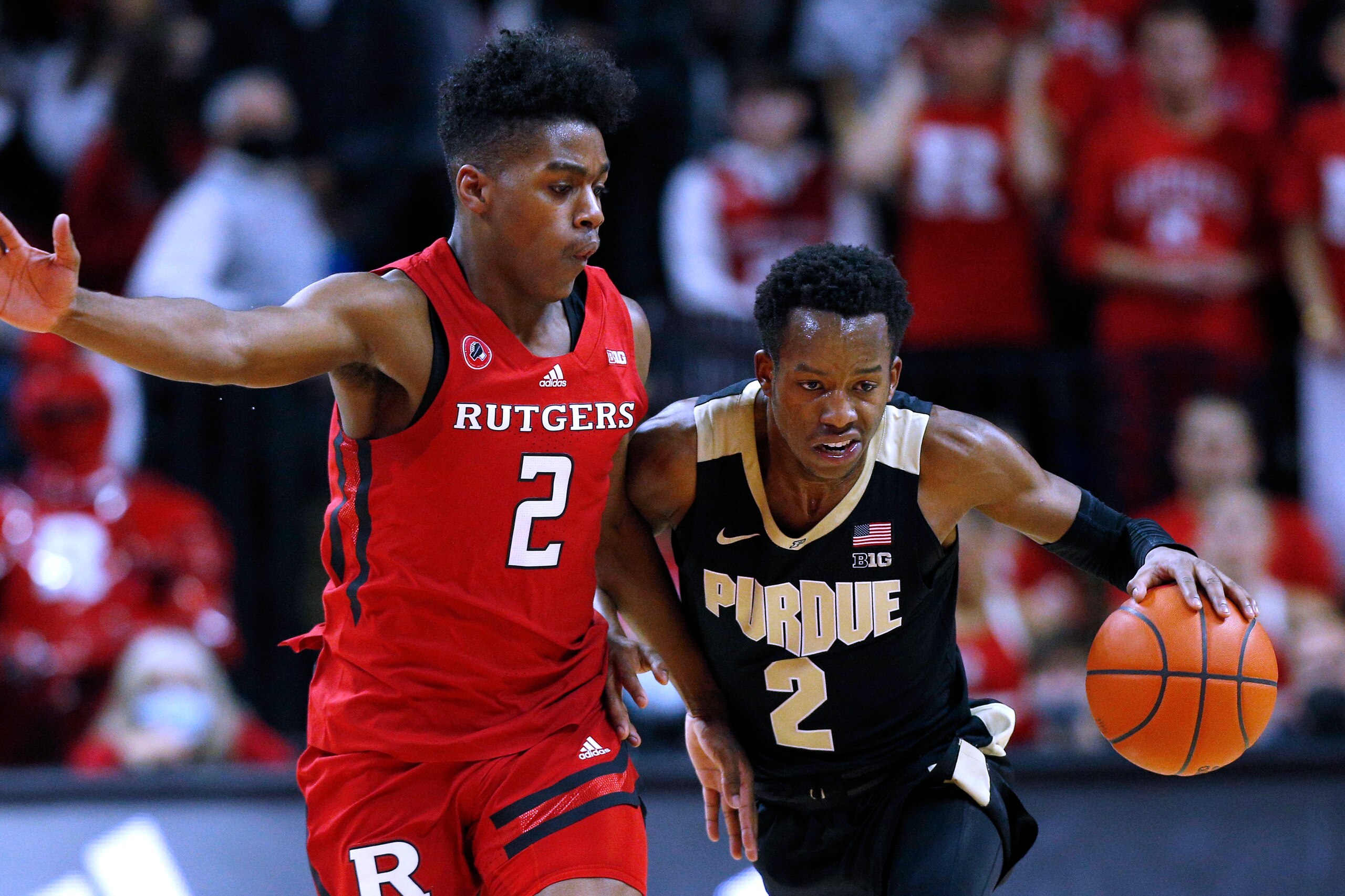 Purdue's Eric Hunter and Rutgers' Jalen Miller