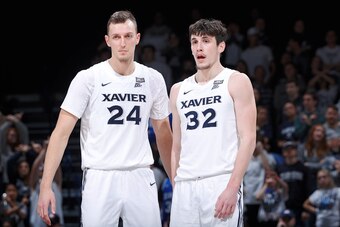 Xavier's Jack Nunge (24) and Zach Freemantle (32)