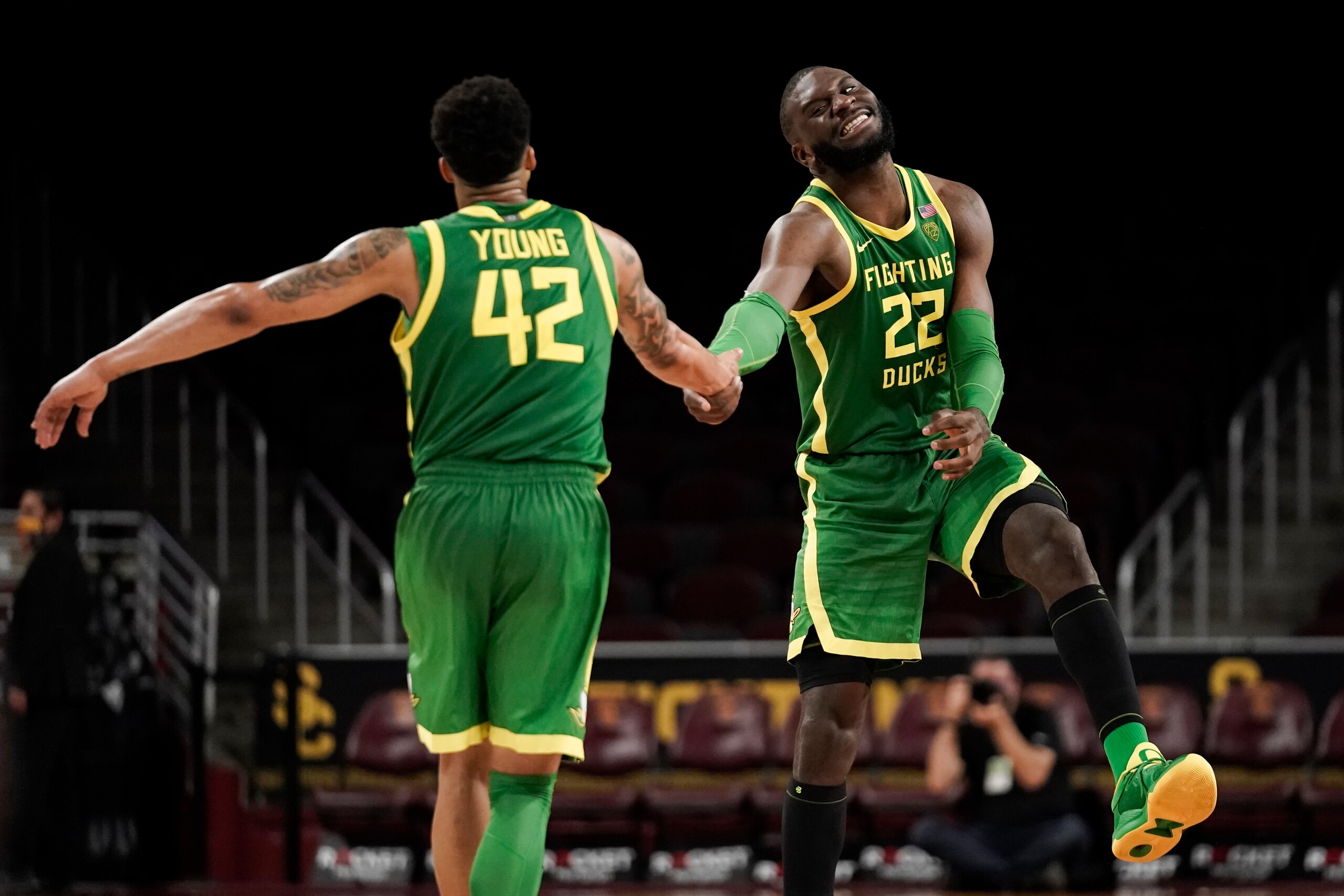Oregon's Jacob Young (42) and Franck Kepnang (22)