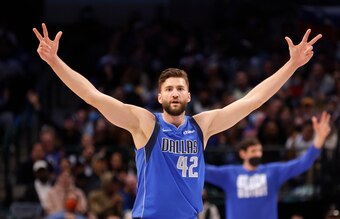 DALLAS, TX - FEBRUARY 8: Maxi Kleber #42 of the Dallas Mavericks reacts after a teammate scores a three point shot against the Detroit Pistons in the second half at American Airlines Center on February 8, 2022 in Dallas, Texas. The Mavericks won 116-86. N