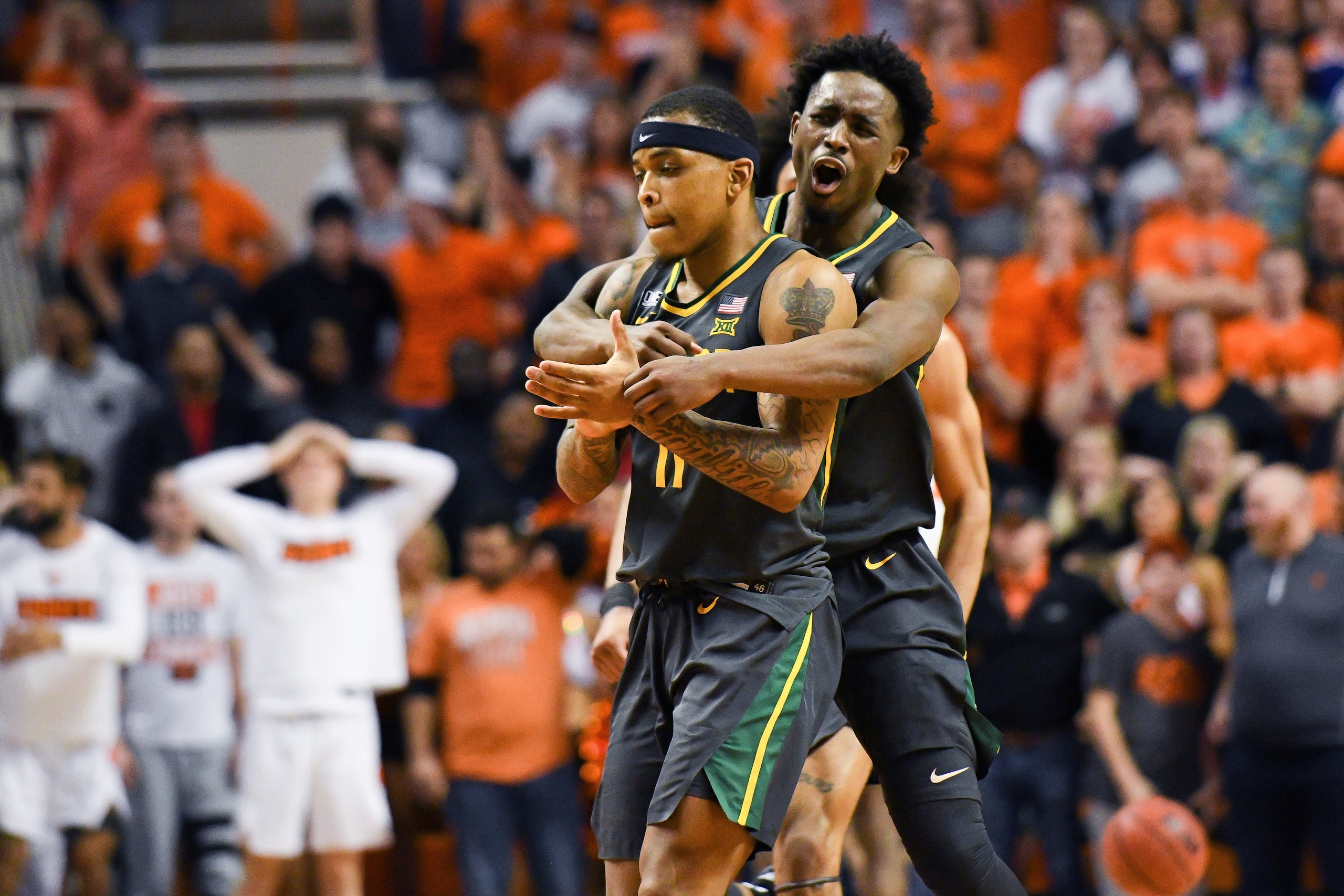 Baylor guards James Akinjo (left) and Adam Flagler