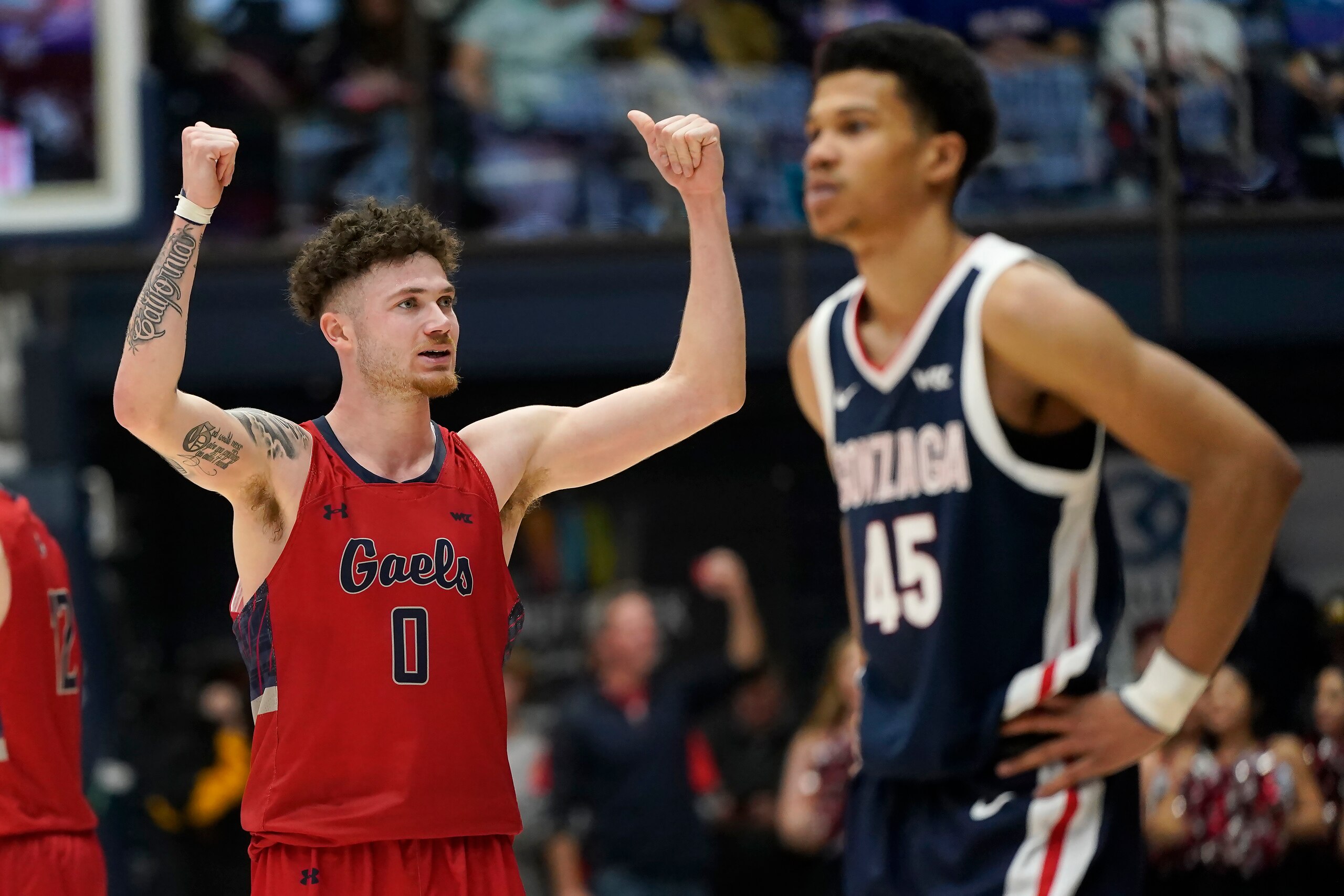 Gonzaga's Rasir Bolton and Saint Mary's Logan Johnson