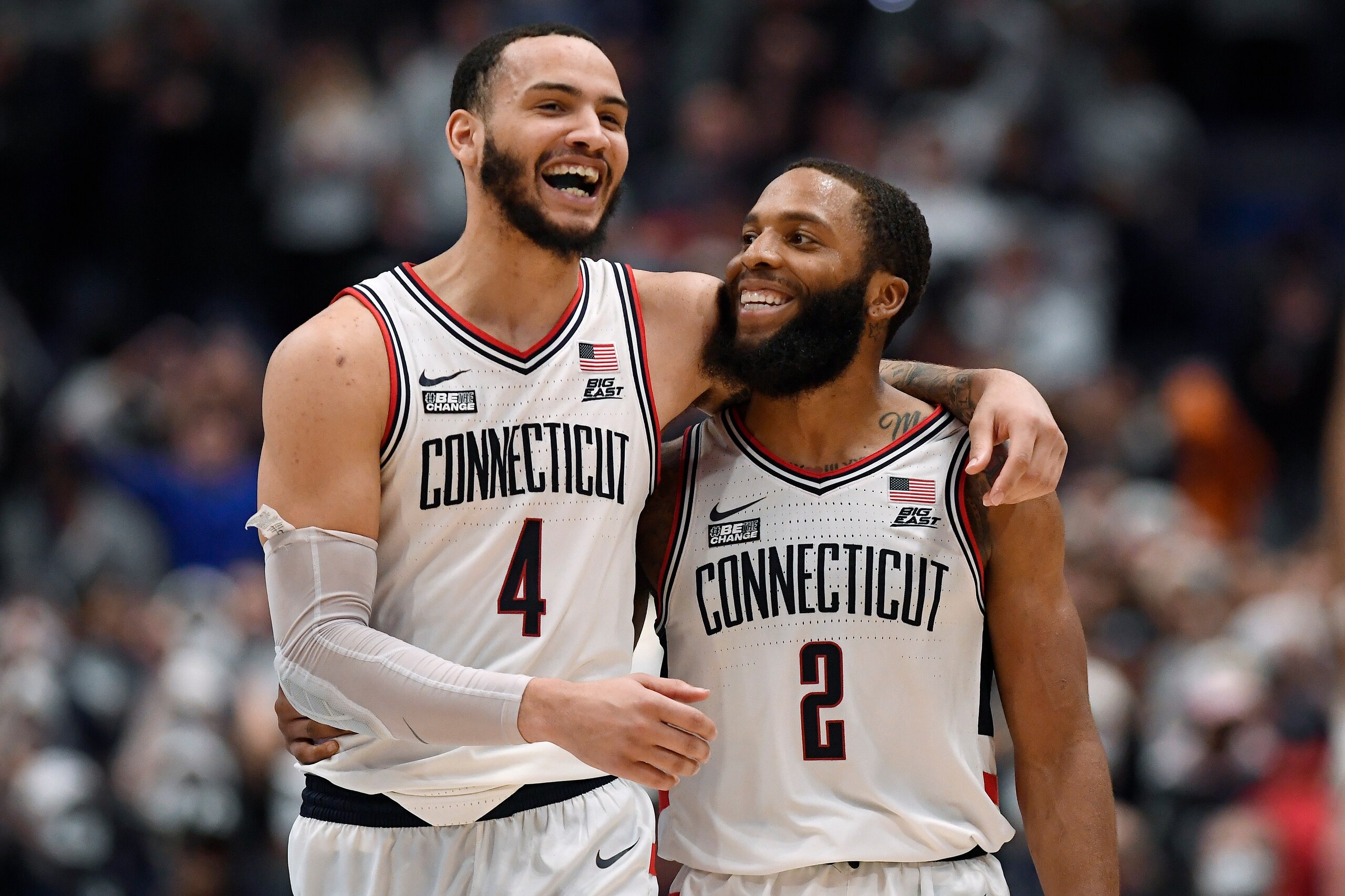 Connecticut's R.J. Cole (2) and Tyrese Martin (4)