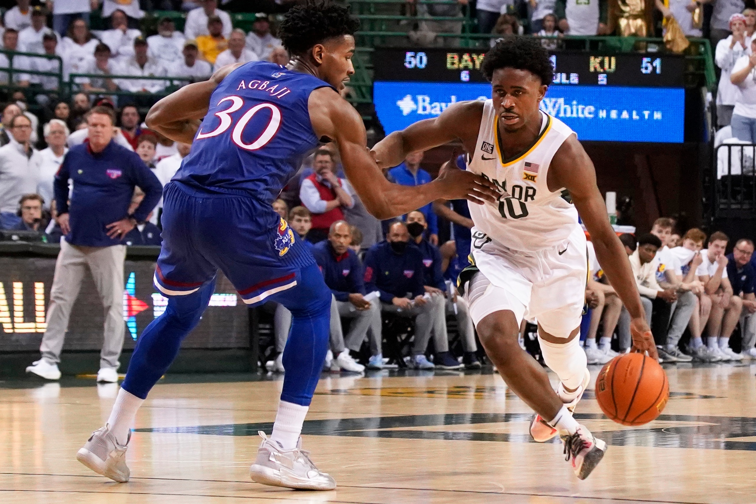 Baylor's Adam Flagler (right) and Kansas' Ochai Agbaji