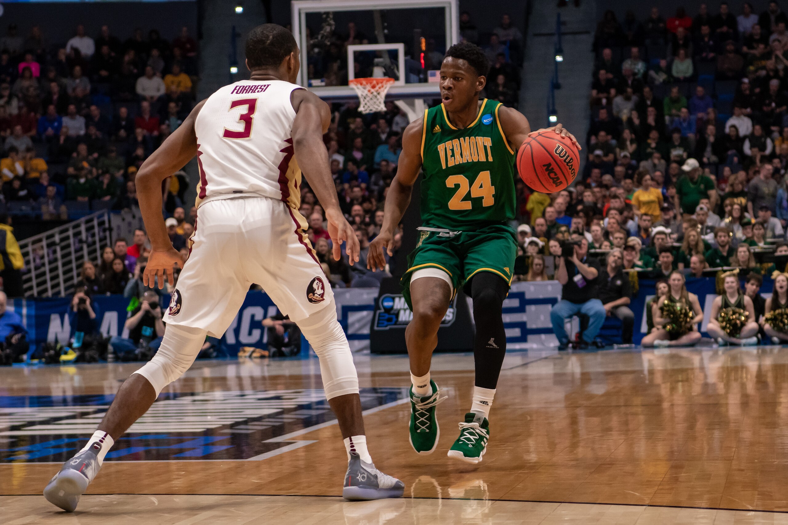 Vermont guard Ben Shungu