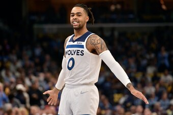 Minnesota Timberwolves guard D'Angelo Russell (0) plays in the first half during Game 2 of a first-round NBA basketball playoff series against the Memphis Grizzlies Tuesday, April 19, 2022, in Memphis, Tenn. (AP Photo/Brandon Dill)